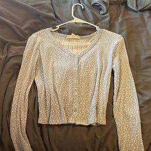 Light blue long-sleeved button up with floral designs